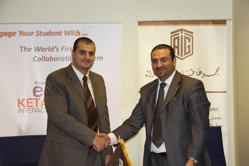 Mr. Tareq Hammad, TAG-Knowledge Executive Director and Mr. Khaled Kalaldeh, CEO of KETAB shaking hands after signing the MoU